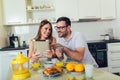 Couple spending money online on the internet Royalty Free Stock Photo