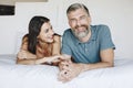 Couple spending their honeymoon in bed