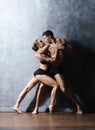 Couple of sporty ballet dancers in art performance. Royalty Free Stock Photo