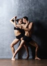 Couple of sporty ballet dancers in art performance. Royalty Free Stock Photo