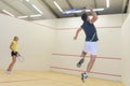 Couple with squash rackets indoor training club Royalty Free Stock Photo