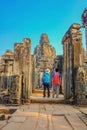 Couple stand infront of bayon temple siem reap cambodia Royalty Free Stock Photo