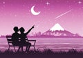 Couple stand near Fuji Mountain and look at the star sand meteor