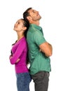 Couple standing back to back land looking up Royalty Free Stock Photo