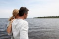 Couple standing by the lake Royalty Free Stock Photo