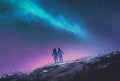 Couple standing looking Milky Way galaxy Royalty Free Stock Photo