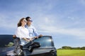 couple standing near the car and enjoy summer vacation