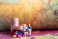 Couple standing next to a coin and a rickshaw Vintage business concept background