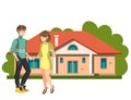 Couple standing outside new home. Royalty Free Stock Photo