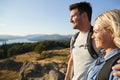 Couple Standing At Top Of Hill On Hike Through Countryside In Lake District UK Royalty Free Stock Photo