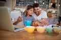 Couple store owner choose mugs for coffee at new open coffee shop