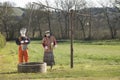 Couple of straw scarecrow for the gardens fair