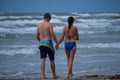 Couple Strolling on the Beach Royalty Free Stock Photo