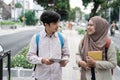 Couple student chatting while walk to campus Royalty Free Stock Photo