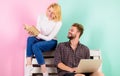 Couple students with book and laptop studying. Modern studying approach digital instead outdated. Man and woman use Royalty Free Stock Photo