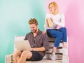 Couple students with book and laptop studying. Modern students use digital approach instead outdated. Man and woman use Royalty Free Stock Photo