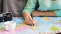 Couple studying world map and marking city to visit