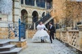 Close-up portraits of stylish newlyweds on the territory of country hotel