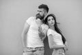 Couple stylish young modern people. Couple in love hang out together grey wall background. Urban loving couple. Couple Royalty Free Stock Photo