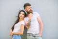 Couple stylish young modern people. Couple in love hang out together grey wall background. Urban loving couple. Couple Royalty Free Stock Photo