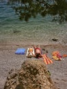 Couple sunbathing on beach