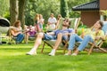 Couple sunbathing in the garden Royalty Free Stock Photo