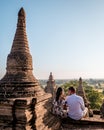 Myanmar, couple sunrise Bagan, men woman sunset Bagan .old city of Bagan Myanmar, Pagan Burma Asia old ruins Pagodas and