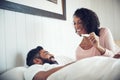 Couple, surprise and happy with pregnancy test, positive and bed with smile, results and excited. Man, woman and baby Royalty Free Stock Photo