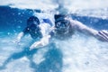 Couple swims or snorkeling underwater Royalty Free Stock Photo