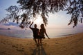 Couple swinging on a swing Royalty Free Stock Photo