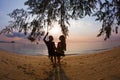 Couple swinging on a swing a Royalty Free Stock Photo