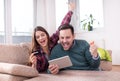 Couple with tablet and credit card at home Royalty Free Stock Photo