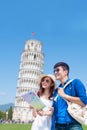 Couple take world map in Italy Royalty Free Stock Photo