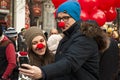 The couple takes a selfie with smartphone