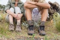 Couple taking break after hiking uphill Royalty Free Stock Photo