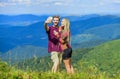 Couple taking photo. Summer vacation concept. Young adventurers. Travel together with darling. Couple in love hiking Royalty Free Stock Photo