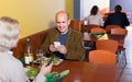 Couple taking photoes of meal Royalty Free Stock Photo