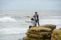 Couple taking photos at the view at the Point Loma tide pools.