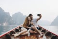 Couple taking picture on boat Royalty Free Stock Photo