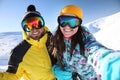 Couple taking selfie on hill. Winter vacation Royalty Free Stock Photo