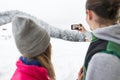 Couple Taking Selfie Photo On Smart Phone Snowy Village Wooden Country House Man Woman Winter Snow Royalty Free Stock Photo