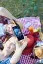 Couple taking selfie on picnic Royalty Free Stock Photo