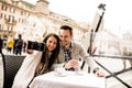 Couple taking selfie in the restaurant in Rome, Italy Royalty Free Stock Photo