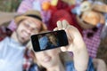 Couple taking selfie on romantic picnic Royalty Free Stock Photo