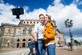 Couple taking selfie at Semperoper in Dresden