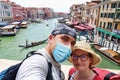 Couple taking selfie in Venice 