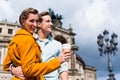 Couple taking walk at Semperoper in Dresden