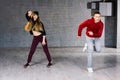 Couple of talented dancers performing hip-hop. Royalty Free Stock Photo