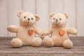 Couple Teddy Bears on wooden background. Valentines Day card. Love heart. Royalty Free Stock Photo