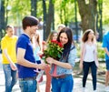 Couple of teenager on date outdoor.